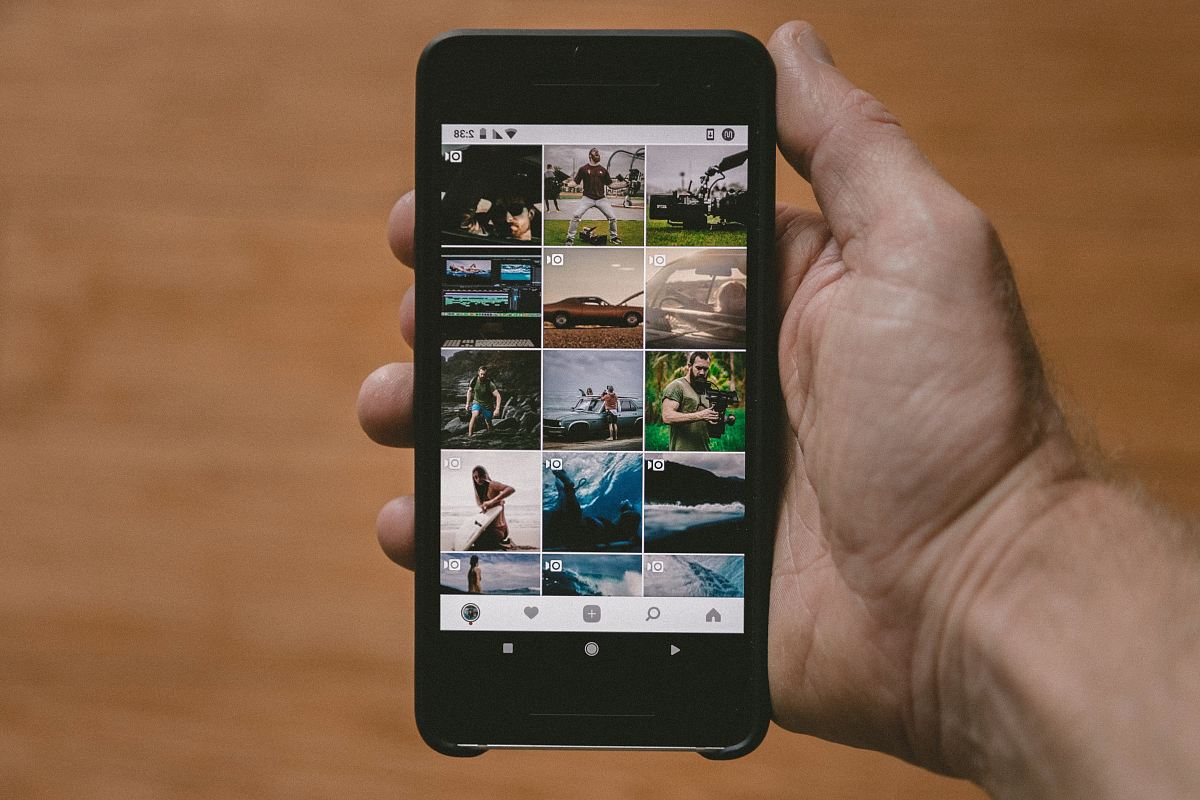 person holding black Android smartphone